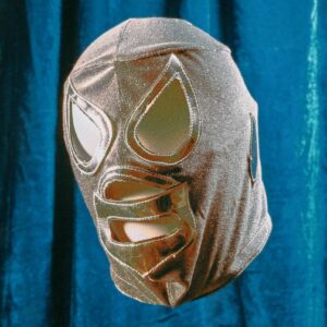 gray mask on blue textile